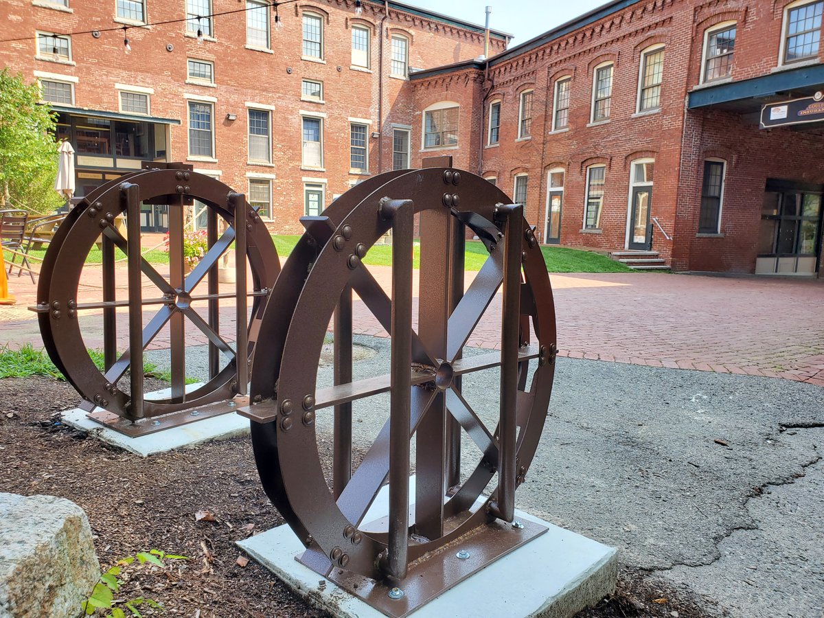 New bicycle racks in the Upper Millyard. Honoring Amesbury's history! 🚲 #AmesburyMA