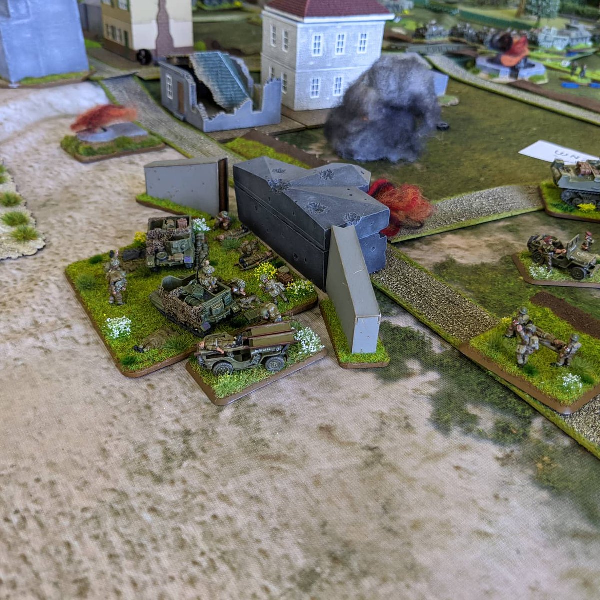 Rob_Oute's tweet photo. WN20 ("Cod") is overrun by infantry and armour. Sherman Crabs start gapping minefields behind the beaches. Infantry and commandos  move forward to attack WN17 ("Hillman") &amp; clear Colleville + St-Aubin on the road to Pegasus Bridge. Wounded are collected on the beach. #Flamesofwar https://t.co/OoMXpOtklK