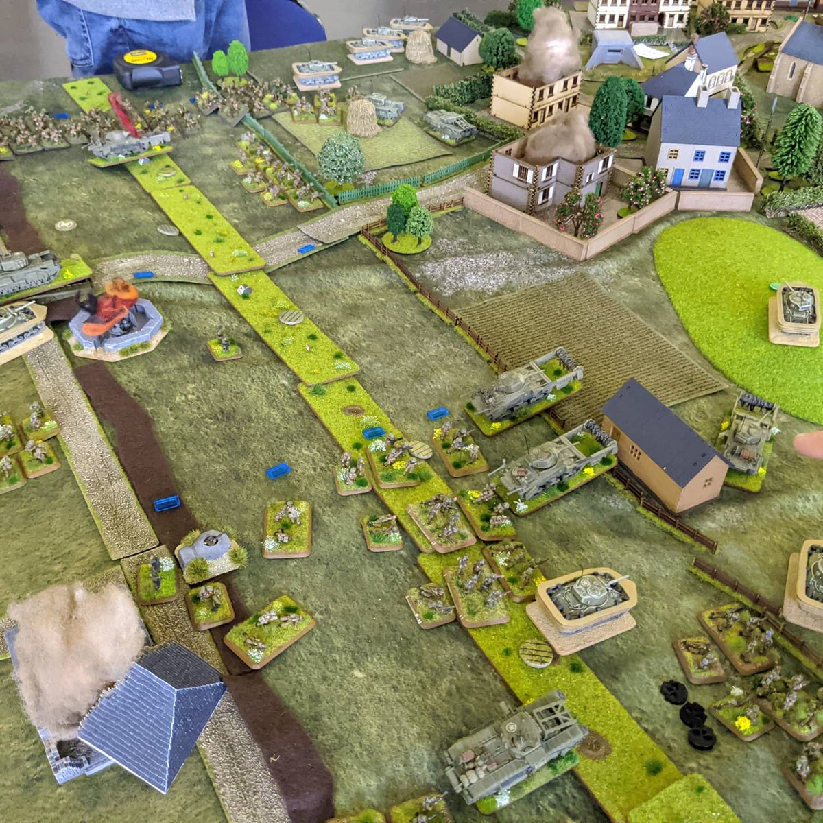 Rob_Oute's tweet photo. WN20 ("Cod") is overrun by infantry and armour. Sherman Crabs start gapping minefields behind the beaches. Infantry and commandos  move forward to attack WN17 ("Hillman") &amp; clear Colleville + St-Aubin on the road to Pegasus Bridge. Wounded are collected on the beach. #Flamesofwar https://t.co/OoMXpOtklK