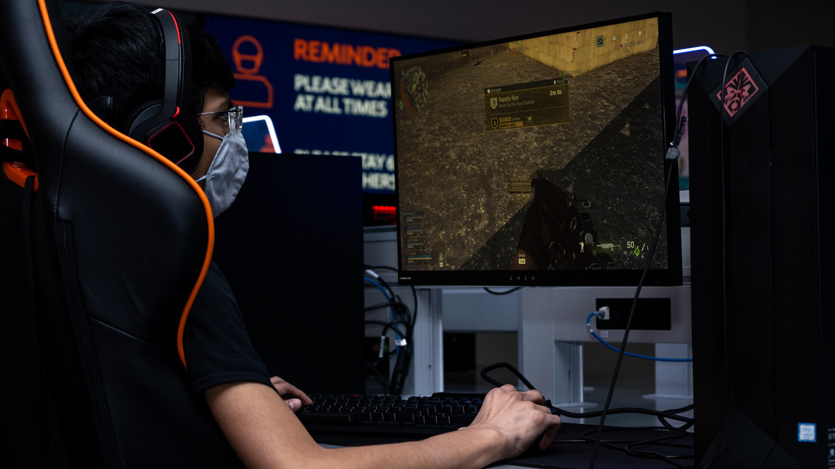 student playing a computer game 