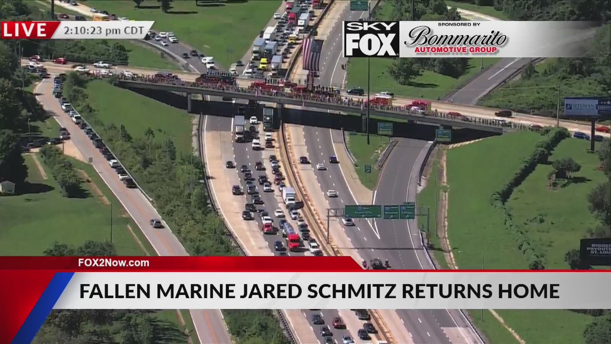 FOX2now's tweet photo. Overpasses and I-70 is lined with people to pay their respects to Lance Corporal Jared Schmitz. #STL #stlouis #marines #usa🇺🇸 https://t.co/tn0HRaEvsf