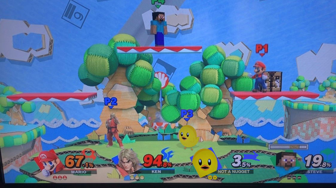 peta's tweet image. My uncle works at #Nintendo and sent me these pictures of the Smash Ultimate beta used to test new DLC characters 😮

The last Fighters Pass 2 character is PETA’s “Not a Nugget” mascot, who’s been featured in several viral spoofs of @NintendoAmerica games!