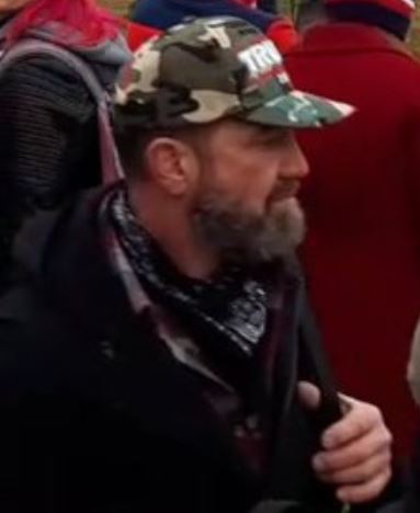 FBI's tweet photo. The #FBI needs your help: Do you recognize the person in these photos? He is one of the individuals who took part in the January 6 violence at the U.S. Capitol. Submit a tip at https://t.co/iL7sD5efWD—and remember to reference photo 338—to help us bring him to justice. https://t.co/uZDGyXs0dB