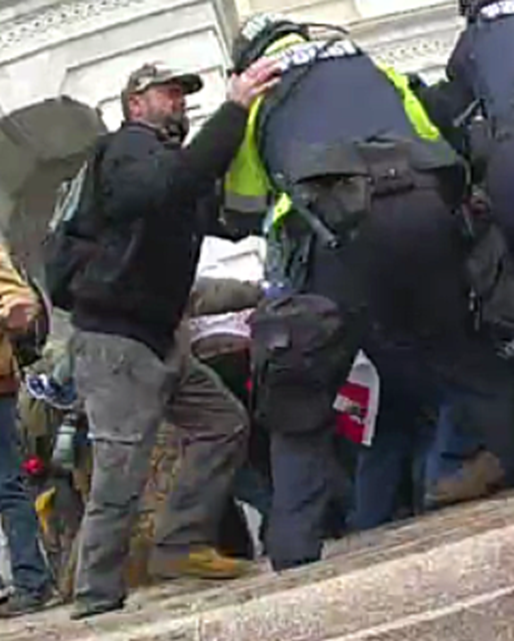 FBI's tweet photo. The #FBI needs your help: Do you recognize the person in these photos? He is one of the individuals who took part in the January 6 violence at the U.S. Capitol. Submit a tip at https://t.co/iL7sD5efWD—and remember to reference photo 338—to help us bring him to justice. https://t.co/uZDGyXs0dB