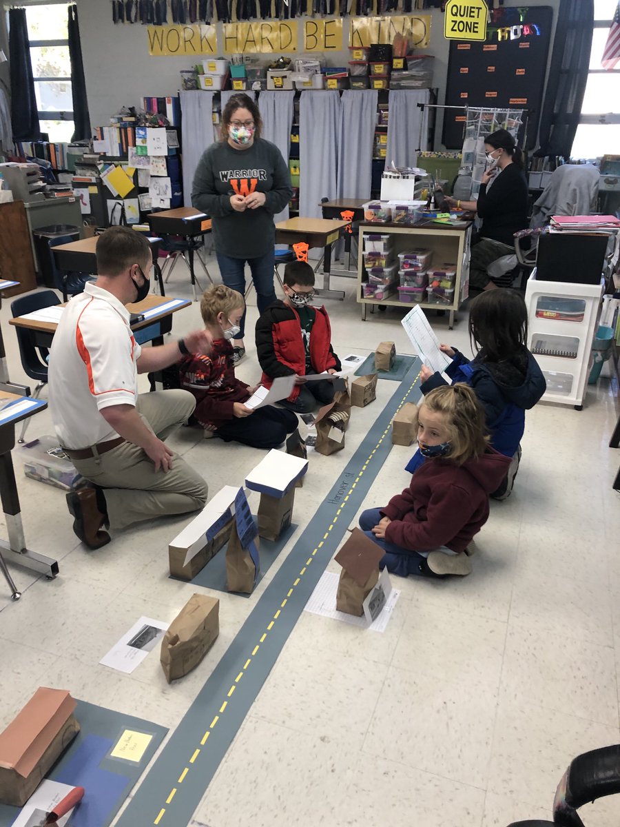 WesclinHS's tweet photo. Thanks to Mrs. Billhartz and her students for showing Mr. Huels and I their “New Baden Pride” in creating a model of Hanover Street in New Baden! Great job by all! #wesclinwarriors #NBExcellence https://t.co/NkvqoGaqyZ