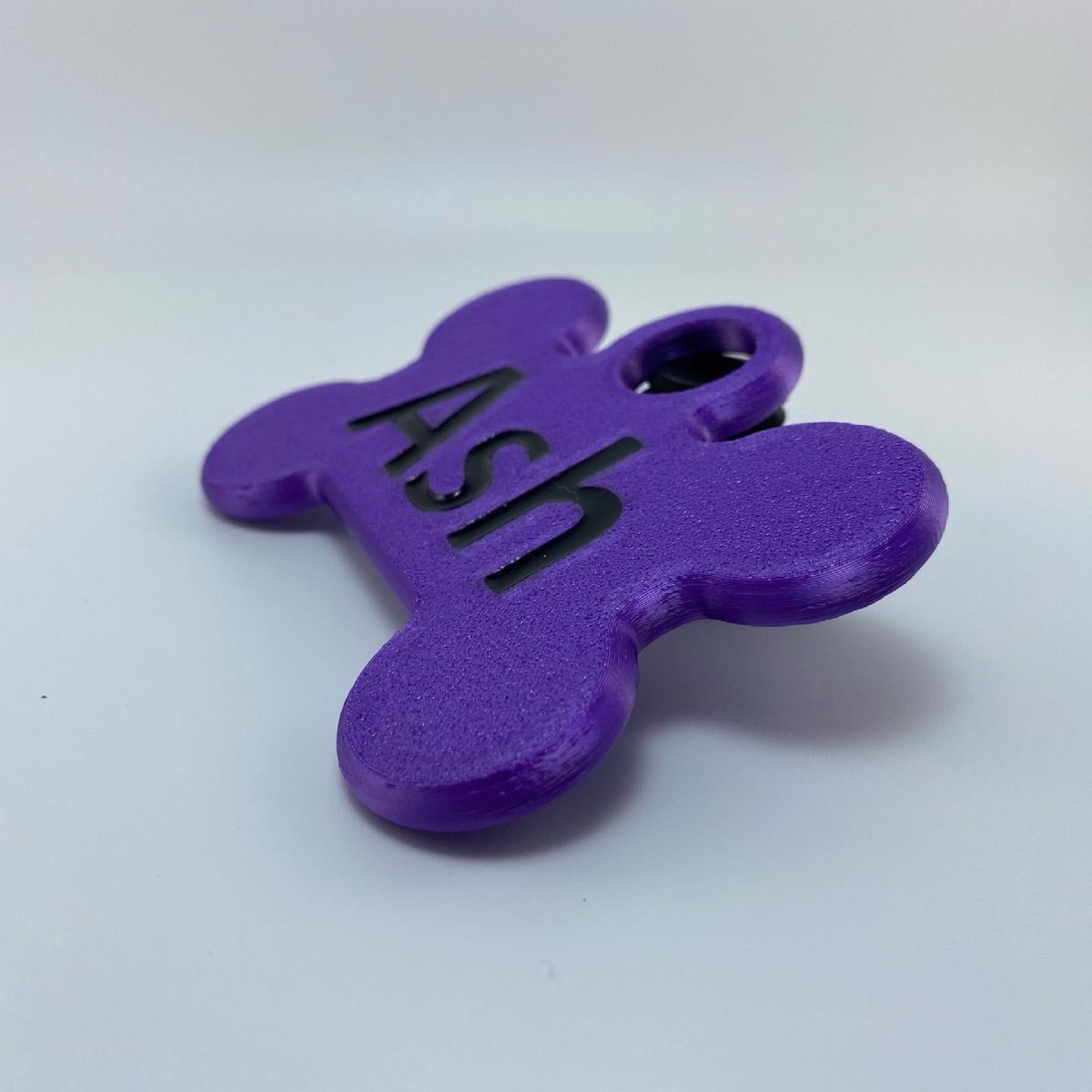AstronautFitz's tweet photo. Now selling custom bone name tags for collars there epoxy filled text and the tag is light and robust and there heka cute.🥰☺️

Now available on my Etsy link to all in bio 🥰

#comission #comissionsopen #furry #furryart https://t.co/F6ilFSTwEO