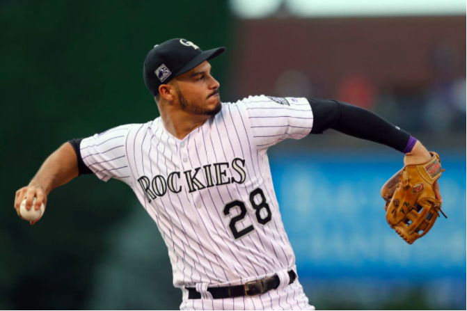 PurpleRow's tweet photo. I always see fans photoshop their favorite team's jersey on players they want on their team, so here is how Cardinal's 3B Nolan Arenado would look in a #Rockies uniform.

Go easy on me, this is my first photoshop. https://t.co/1og1cebPSR