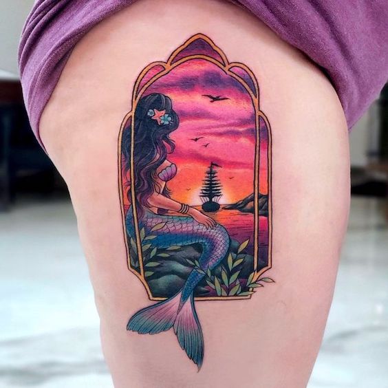 Mermaid tattoos with mirror presents self-value. It can represent how you see yourself. Mermaids are often portrayed with shells, such as a shell bra, for example, mirrors, bracelet, or earrings.