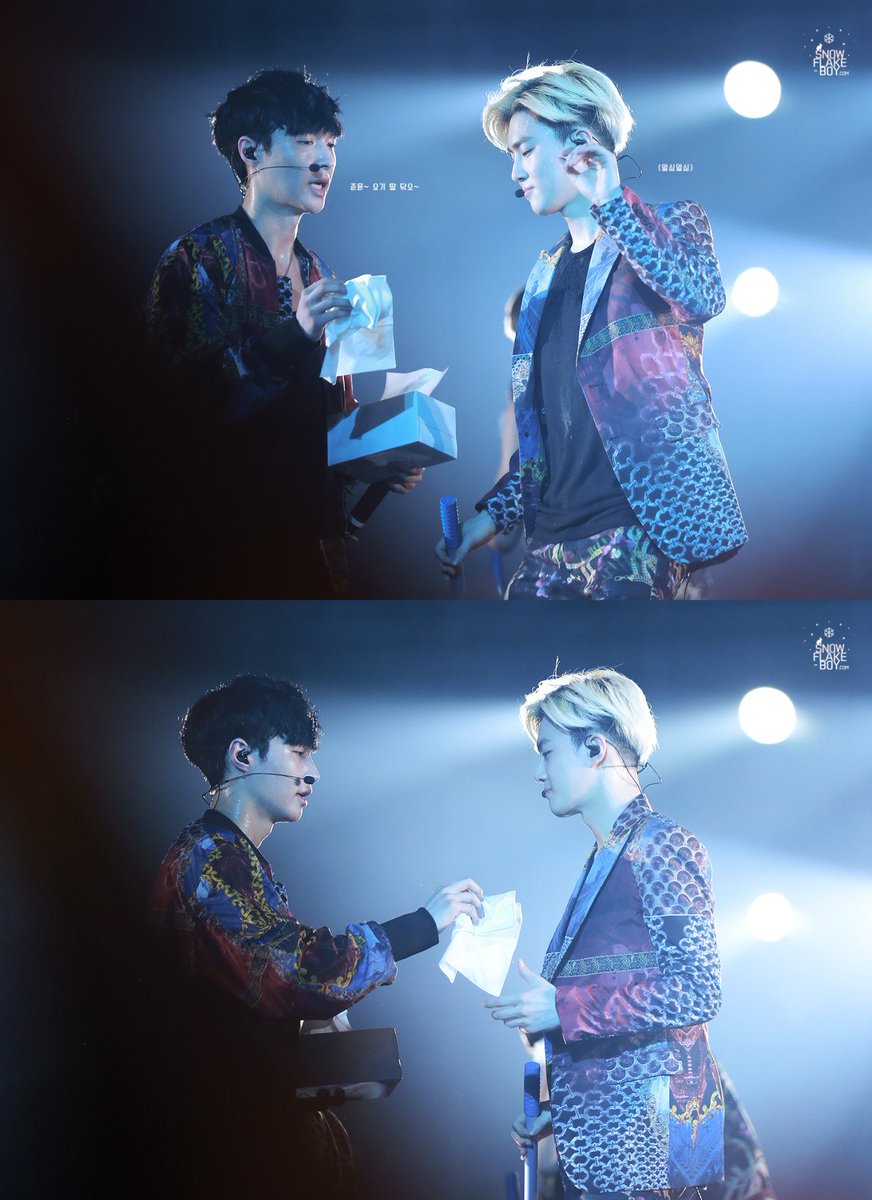  yixing taking care of junmyeon in small ways like handing him a water bottle or tissues after they perform.
