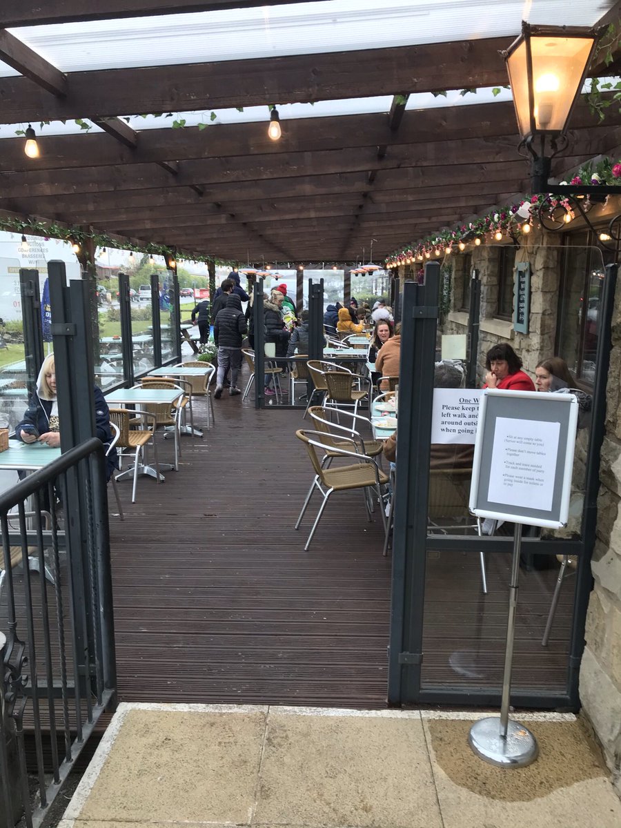 The rain won’t stop our customers from enjoying a meal in our covered seating area