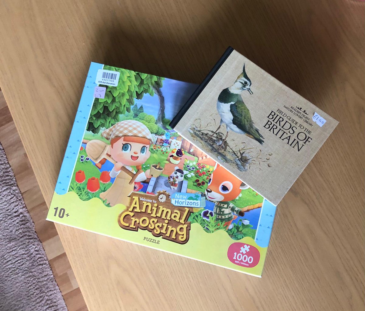 CSanchezSoriano's tweet photo. Way to ignore my also very impressive haul. A beautifully illustrated book about british birds and an incredibly challenging 1000 piece Animal Crossing puzzle for £3.5. https://t.co/PFZnNFZeK5