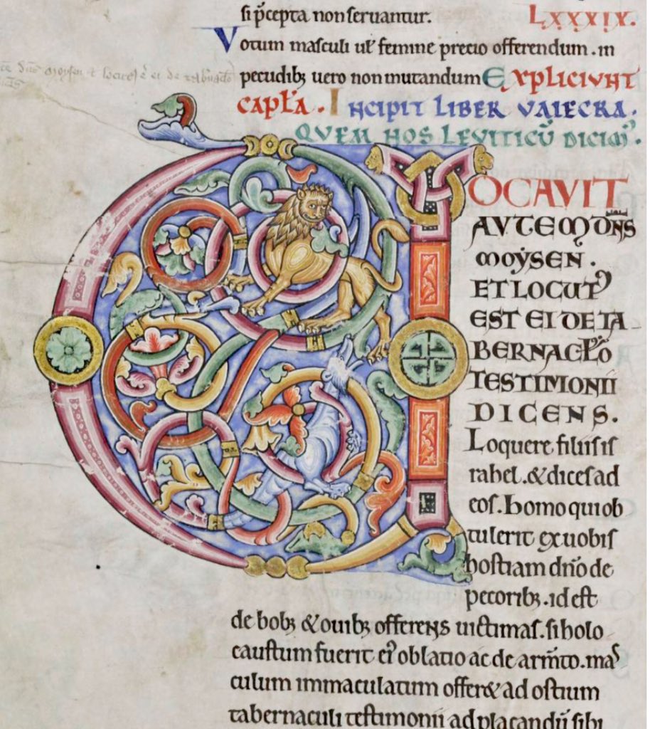 Initial 'V'(ocavit) at the beginning of Leviticus inhabited by a dragon and lion. #MS003TheDoverBibleCambridge, Corpus Christi College, MS 003; The Dover Bible, Volume I; 12th century; f.41v  @ParkerLibCCCC