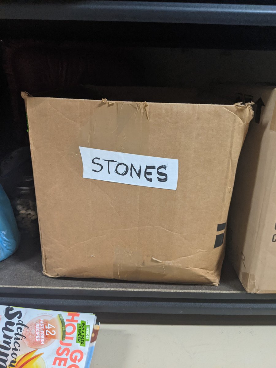 Stones. I did not open this box. I assume it is heavy.