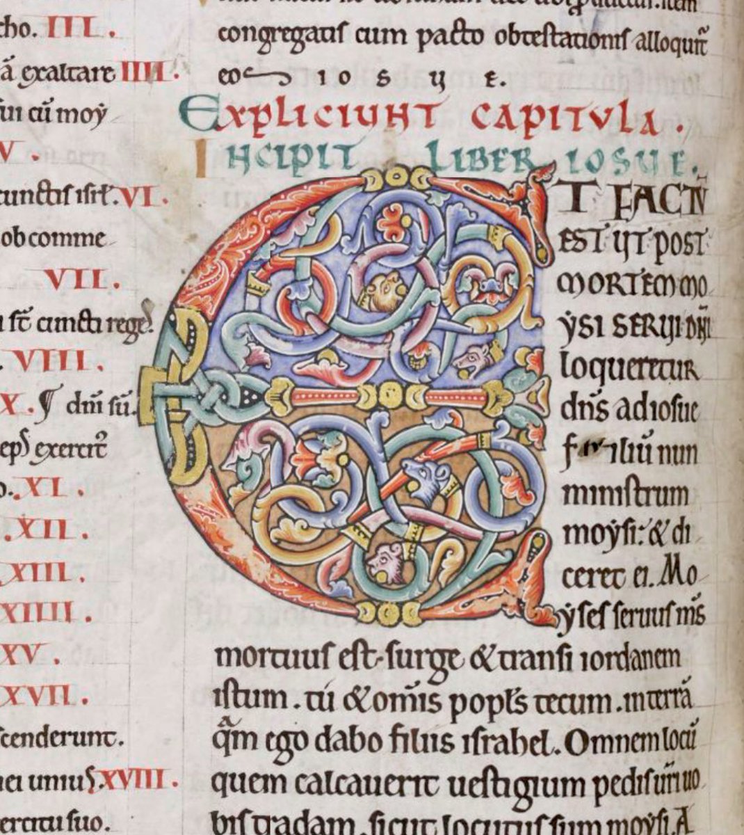 Ornamented initial 'E'(t) with animal heads at the beginning of Joshua #MS003TheDoverBibleCambridge, Corpus Christi College, MS 003; The Dover Bible, Volume I; 12th century; f.89v  @ParkerLibCCCC