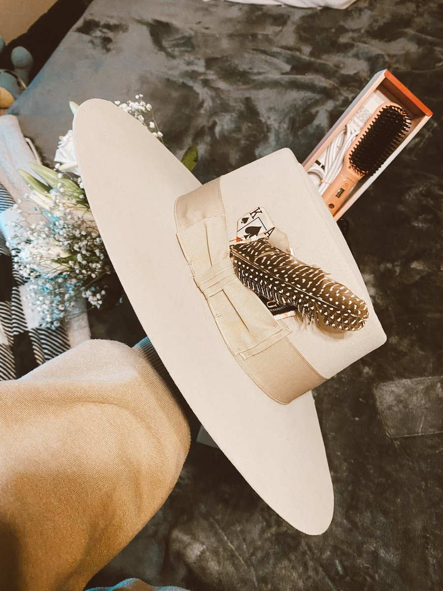 balhal5's tweet photo. My boyfriend brought me my Mother’s Day gift tonight. 🥺
My first STETSON hat. I tried this on a couple weeks ago &amp; he went back and got it for me. 
My fav flowers wrapped in a wrap i pointed out to him like a month ago @ target. 
A hair straightening brush I mentioned ONE TIME https://t.co/Xfz6JcYIB6