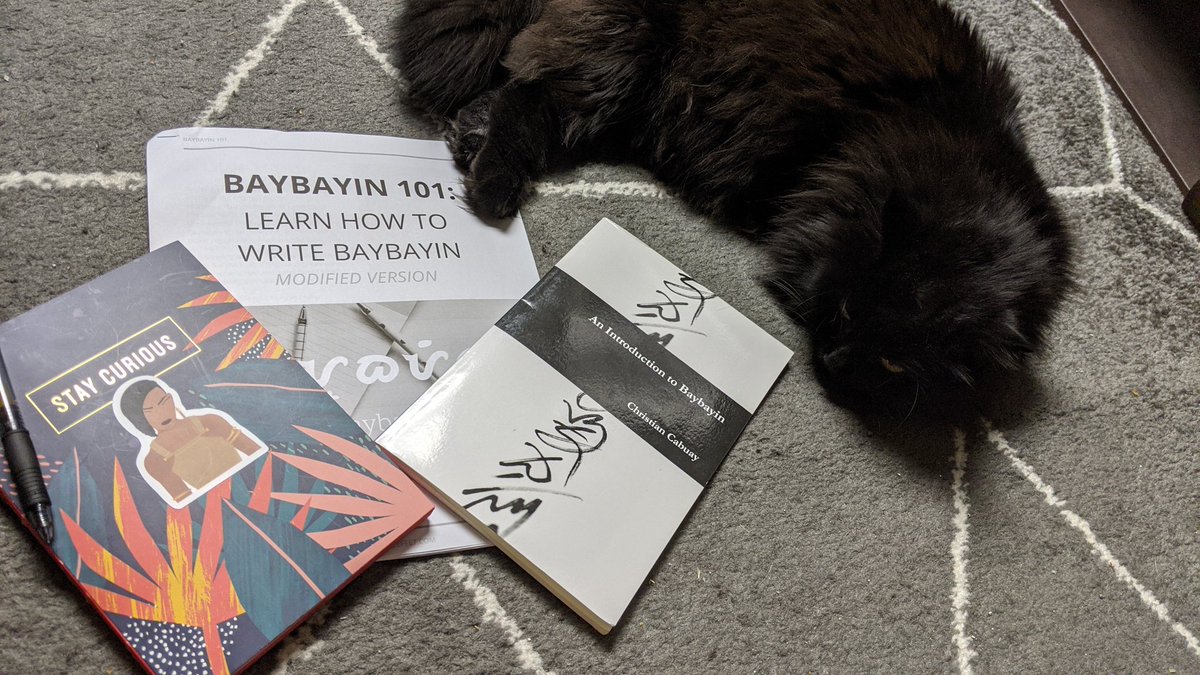 Ordered a book on Amazon, found a free "workbook", and a pretty journal to practice Baybayin(Shadow wanted to be part of the pic )