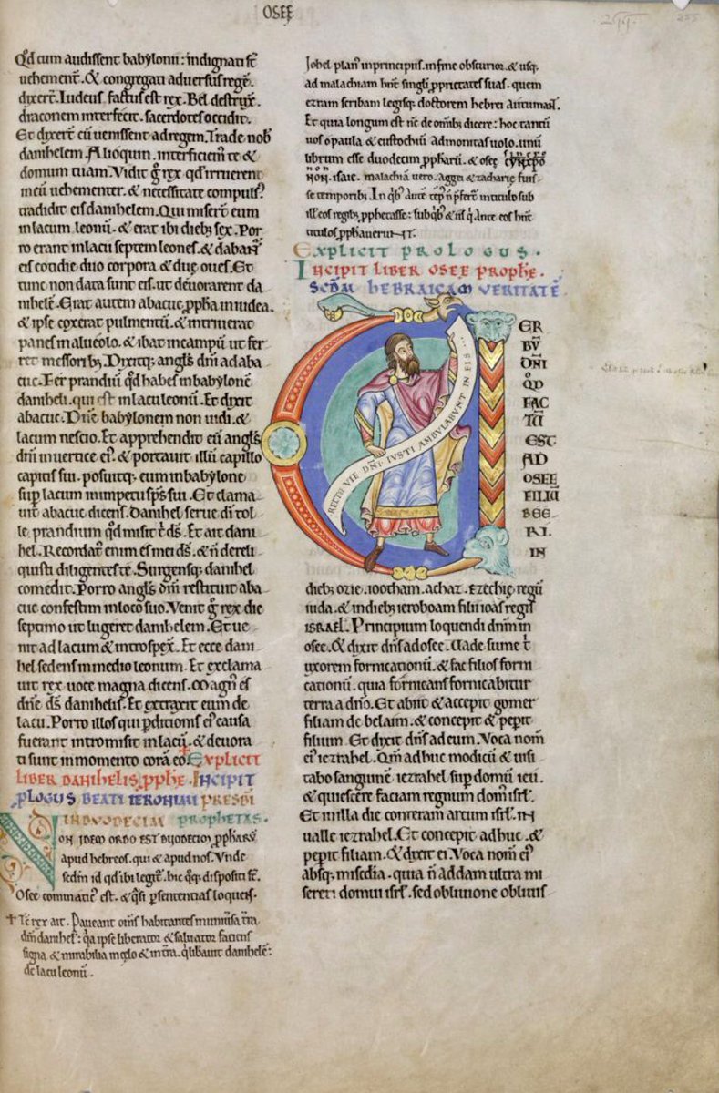 Historiated initial 'V'(erbum) at the beginning of Hosea depicting Hosea holding a scroll in his hands: 'Recte vie domini iusti ambulabunt in eis'. #MS003TheDoverBibleCambridge, Corpus Christi College, MS 003; The Dover Bible, Volume I; 12th century; f.255r  @ParkerLibCCCC