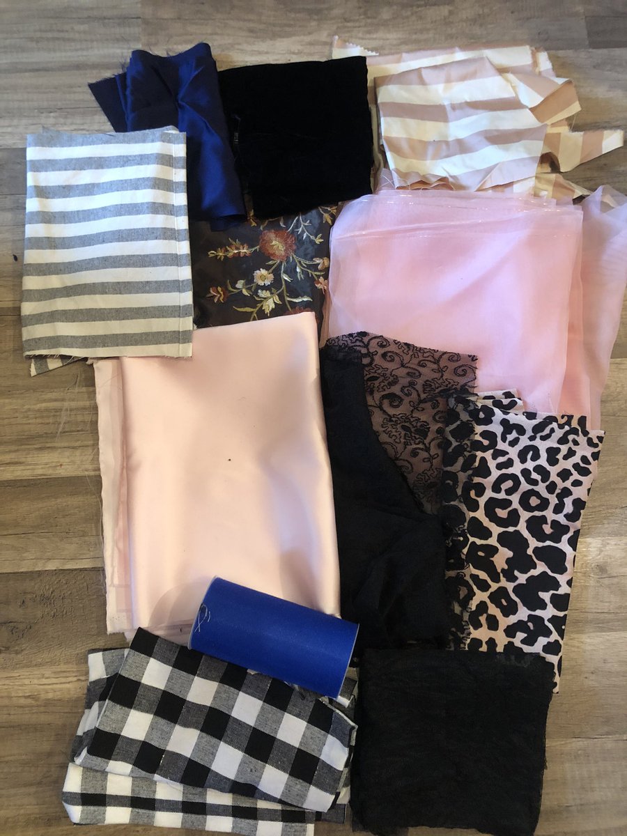Lot 7Linen table cloth scraps, poly duchess satin, 2 black meshes, pink and cream striped silk, pink silk organza in multiple pieces, embroidered scrap, poly cheetah print, 20 yard roll of blue tulle trim, scrap of blue silk charmeuse