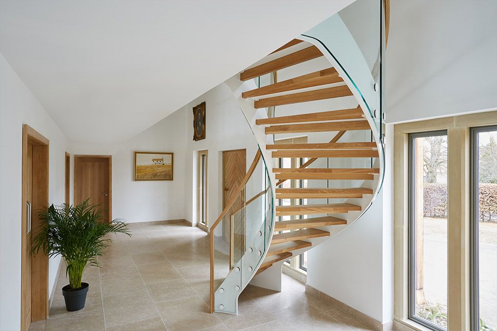 Our curved staircase range is like no other. Rolled steel, 40mm anti slip treads, toughened and curved glass and complete with the finest curved handrails. Sheer perfection from our team of talented designers and installers! #curvedstairs #curvedstaircase #design #stairs