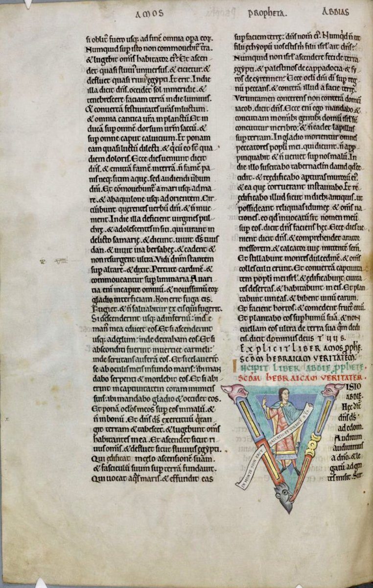 Initial 'V'(isio) at the beginning of Obadiah with Obadiah holding a scroll on which is written: 'In monte Sion erit salvatio et vocabitur sanctus'. #MS003TheDoverBibleCambridge, Corpus Christi College, MS 003; The Dover Bible, Volume I; 12th century; f.261v  @ParkerLibCCCC