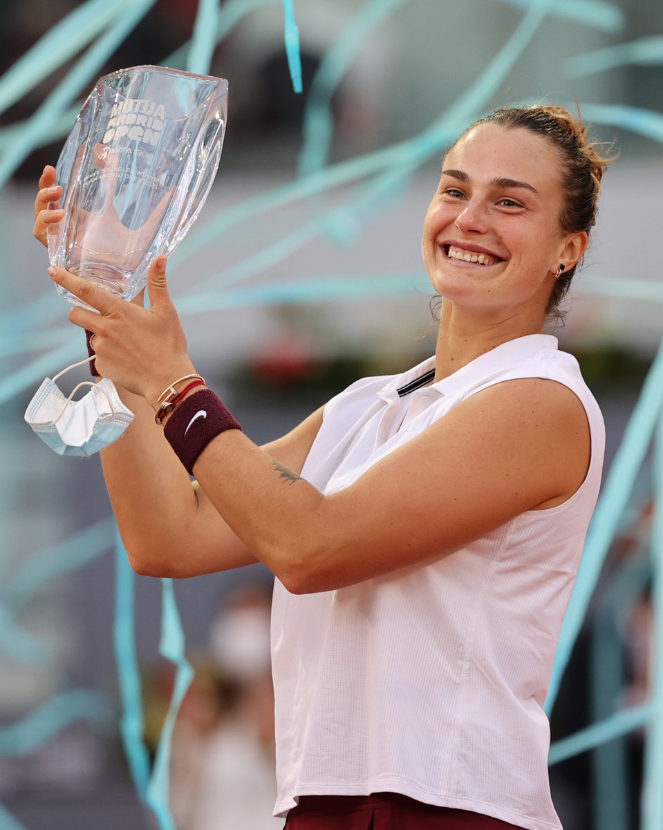 Aryna Sabalenka celebrates with the women’s singles final trophy following the women’s single final match between Aryna Sabalenka and Ashleigh Barty on Day Ten of the Mutua Madrid Open at La Caja Magica on May 08, 2021 in Madrid, Spain.