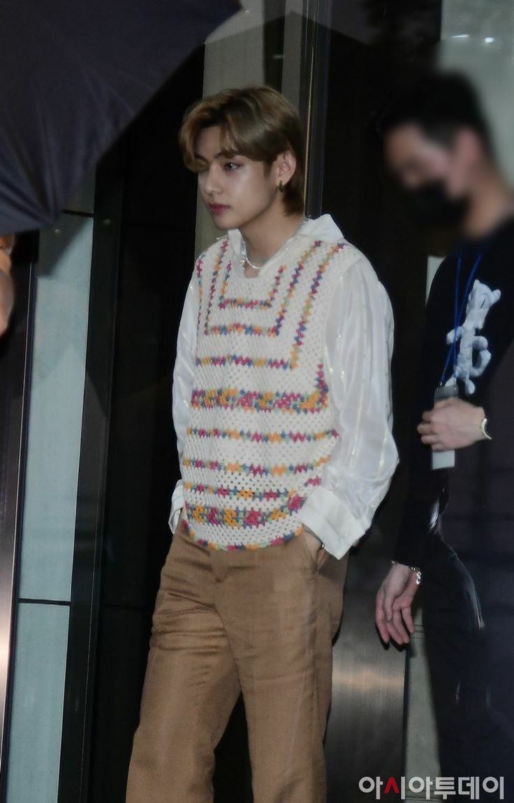 Taehyung wearing a vest ; a much needed thread
