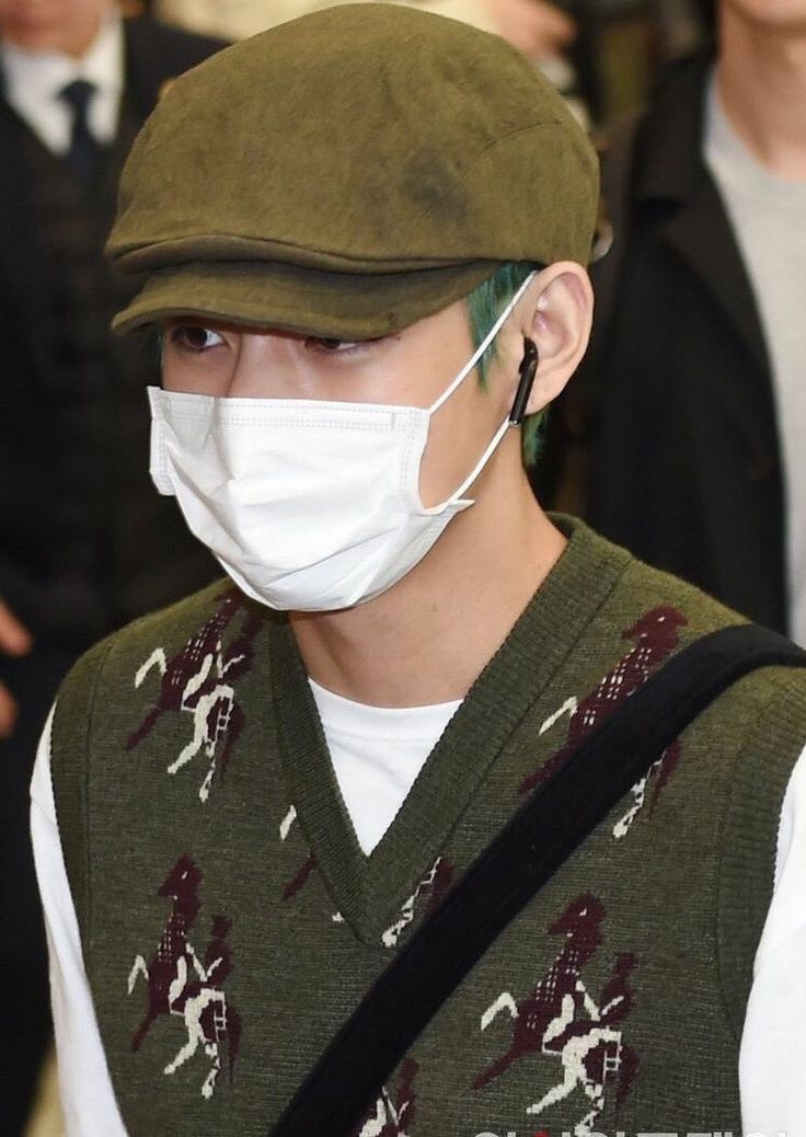 Taehyung wearing a vest ; a much needed thread