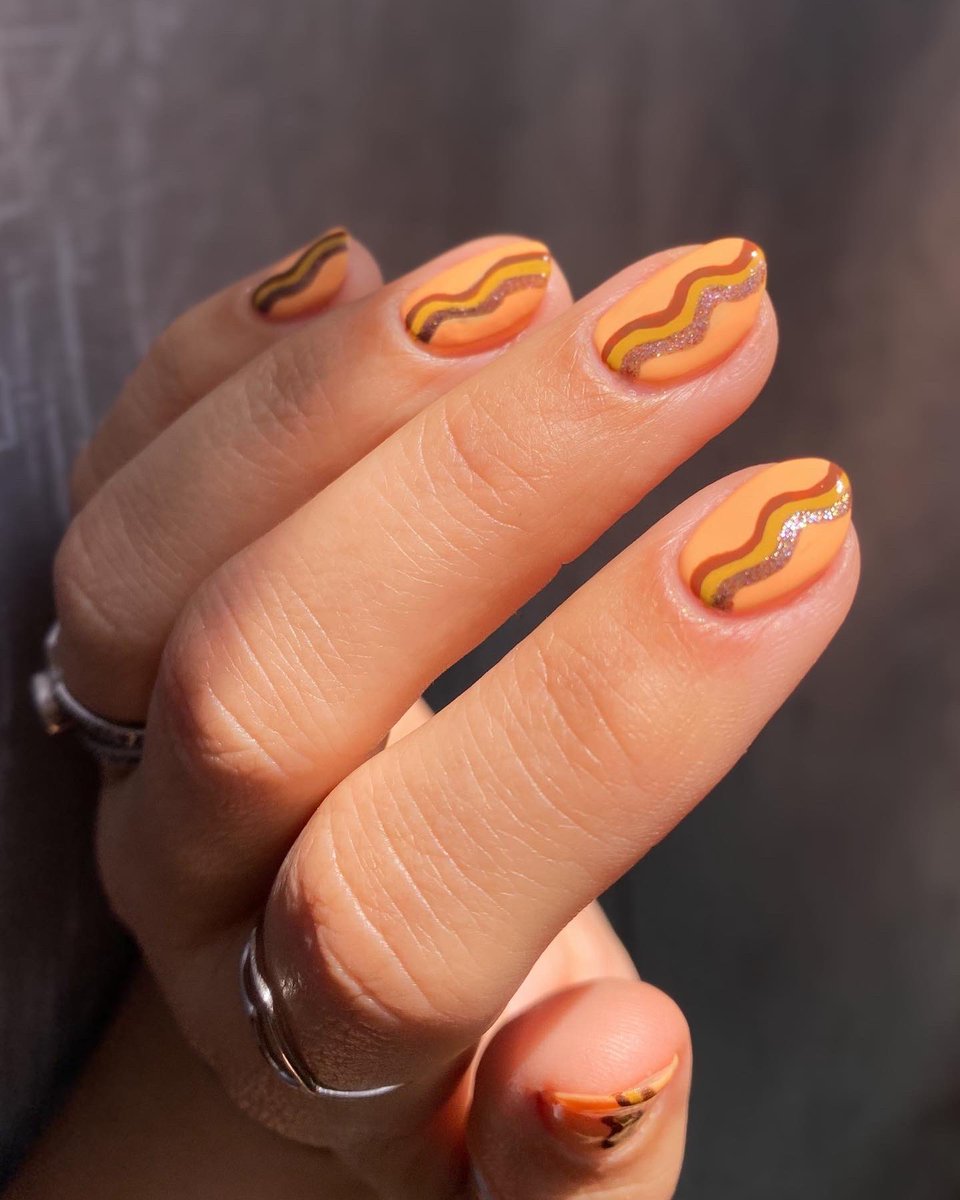 RuthsNailArt's tweet photo. Today’s touch of sparkle palette is brought to you by Ruth Polish! Base color is “James” topped with “Nude” &amp; “Toast”! Loving these!!! I hope you like them too and have a great weekend! 🧡🤎🤍✨ https://t.co/T0SN3wK7Vz