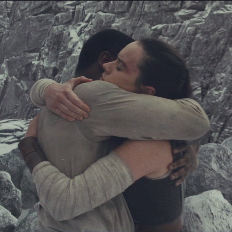 Their reunion at the end is very important. As the trio hugs, Poe is happy and smiling, but both Rey & Finn are crying. They are happy and alive. But they can sense each others emotions and the relief of both of them being alive after all they went through, is overwhelming.