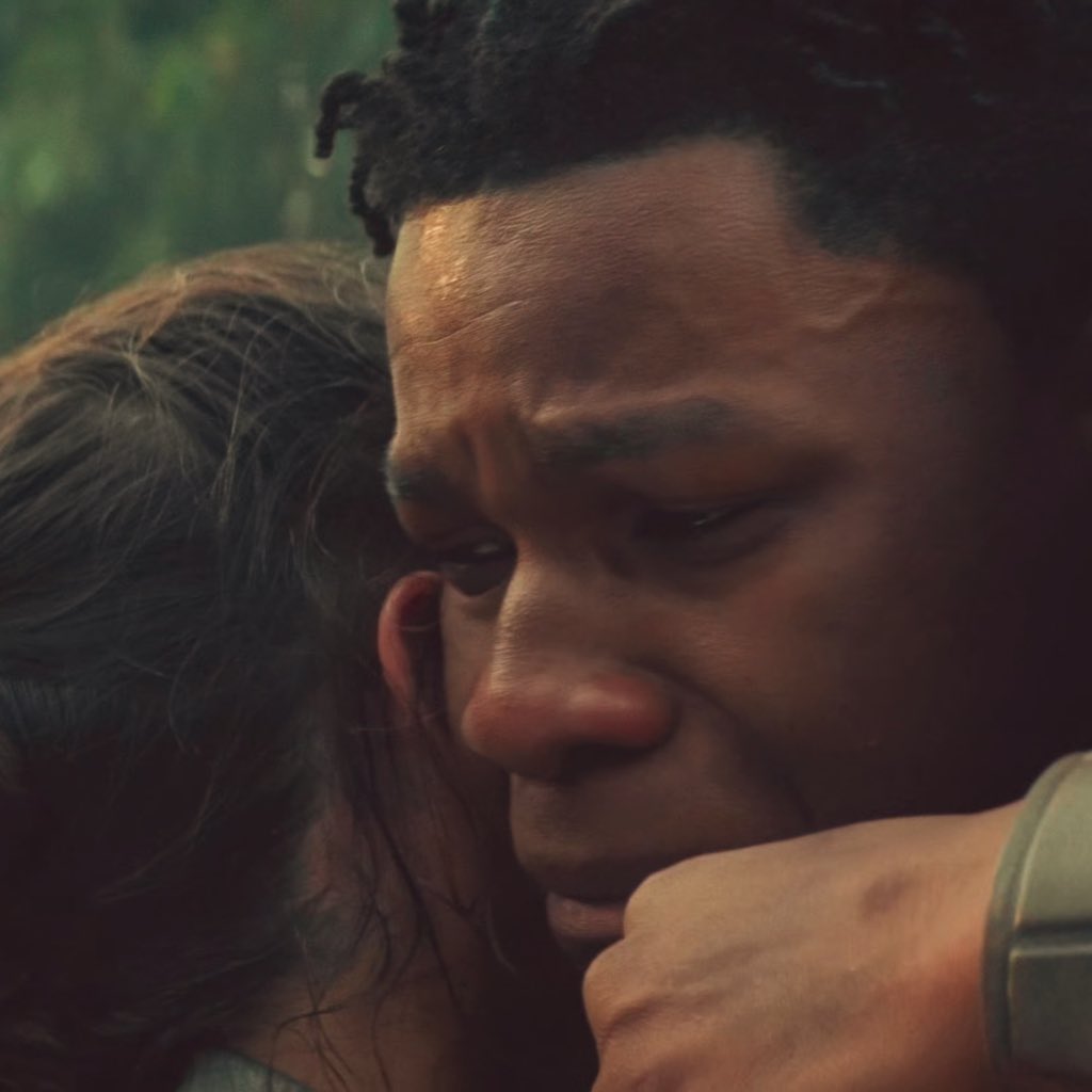Their reunion at the end is very important. As the trio hugs, Poe is happy and smiling, but both Rey & Finn are crying. They are happy and alive. But they can sense each others emotions and the relief of both of them being alive after all they went through, is overwhelming.