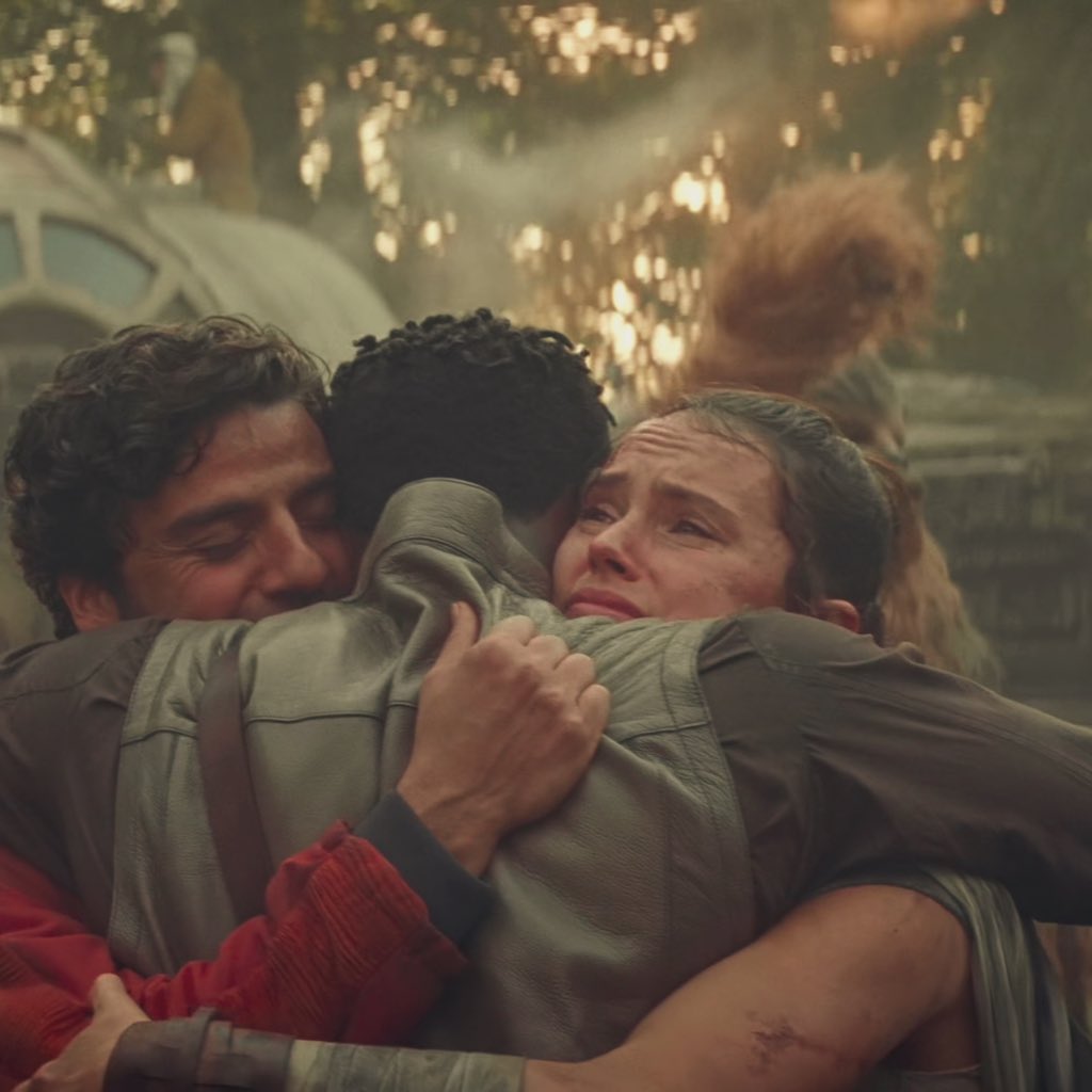 Their reunion at the end is very important. As the trio hugs, Poe is happy and smiling, but both Rey & Finn are crying. They are happy and alive. But they can sense each others emotions and the relief of both of them being alive after all they went through, is overwhelming.