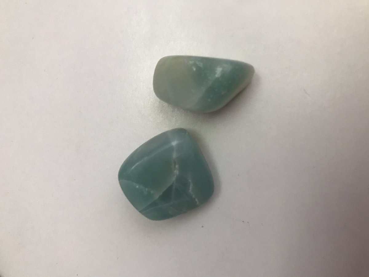 amazonite/carribean blue calcite (the one at the bottom of the picture had a star pattern if you look close :0)