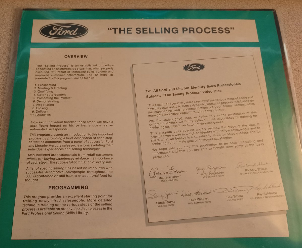 onto the main event: THE FORDS! These all seem to have the same front cover, but a different B&W back cover.This one is on "The Selling Process", and is training material for Ford salespeoples.