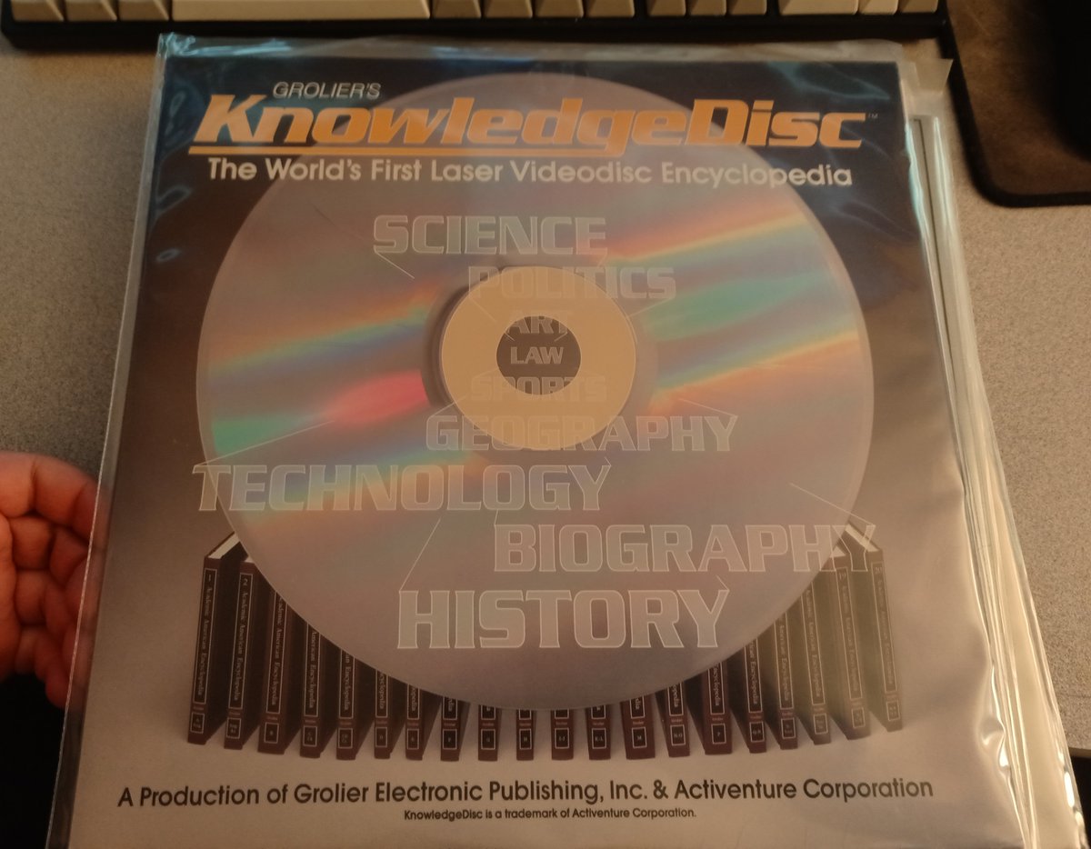 and finally, yes, finally, a Grolier's KnowledgeDisc!This is a cool idea of putting an encyclopedia on a laserdisc: They encode pictures on individual frames and let you seek to them by inputting the frame numbers.