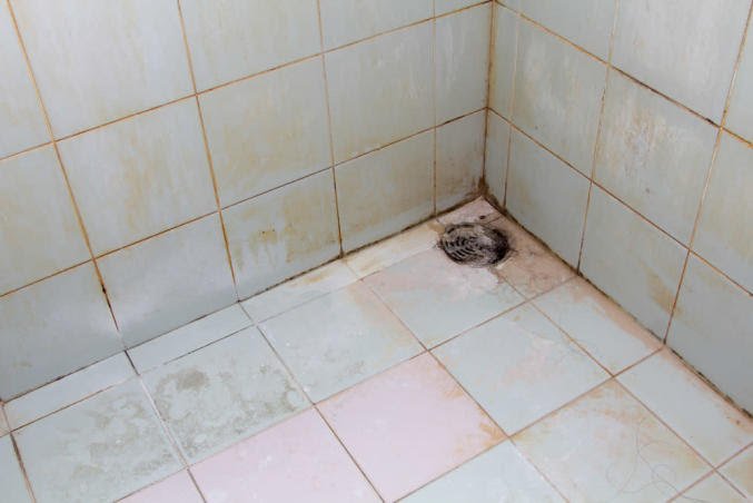 How to Repair a Water-Damaged Wall in the Bathroom