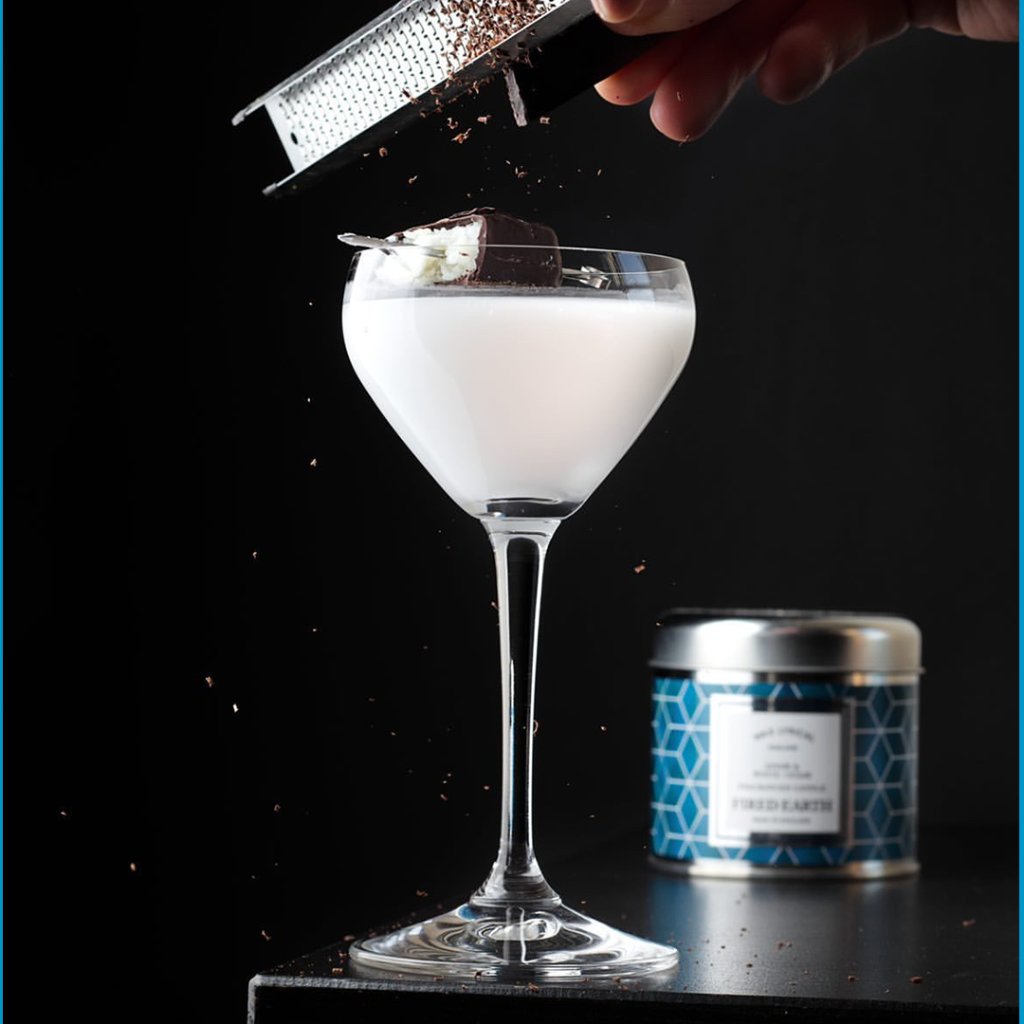 A taste of paradise by Ed_Tales on Instagram 

50ml Koko Kanu Coconut Rum
12.5ml Coconut Cream
12.5ml Cacao blanc liqueur
50ml Coconut milk
Half a dark Bounty garnish  
Grated 90% dark chocolate  

Save this one to make later!