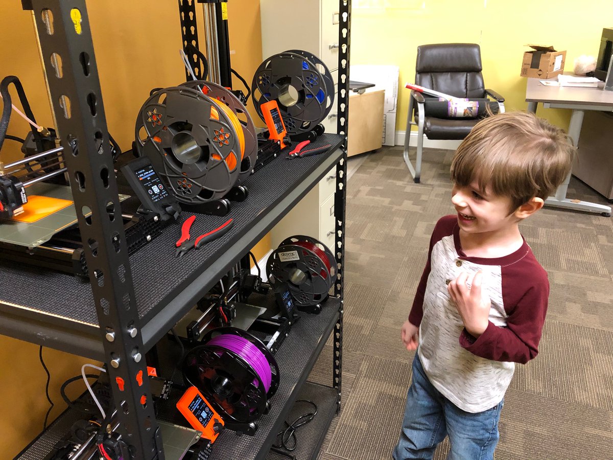 Took my kid to see the #3Dprinting community center this morning. He loved watching the <a href="/Prusa3D/">Prusa3D</a> minis! Almost done setting up the center. Outdoor sign and dry erase tables are on order and arriving soon.