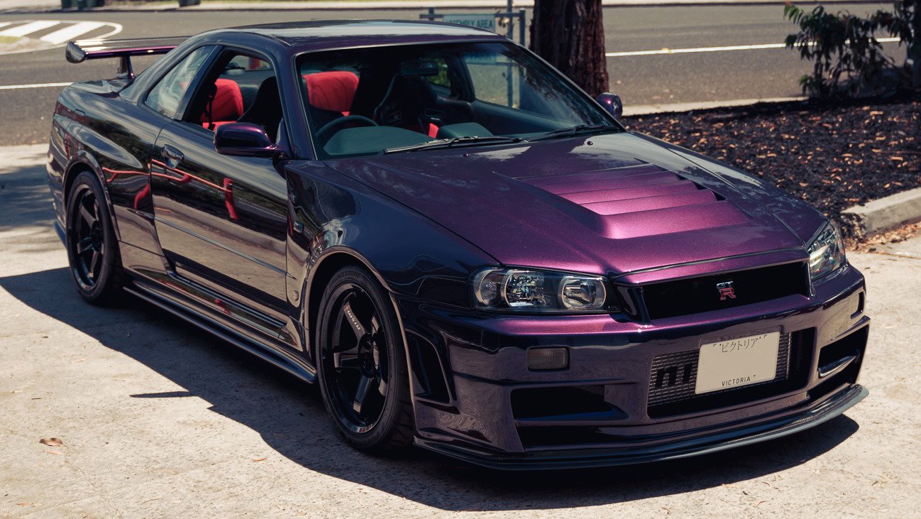 Скайлайн редан осу. Nissan Skyline r34 Midnight Purple. Nissan Skyline GTR r34 фиолетовый. Nissan Skyline r34 Purple. Nissan Skyline GTR r34 Midnight Purple.