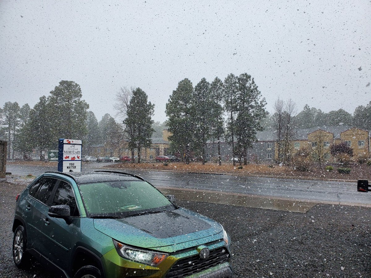 It is snowing some big flakes here in the beautiful White Mountains.