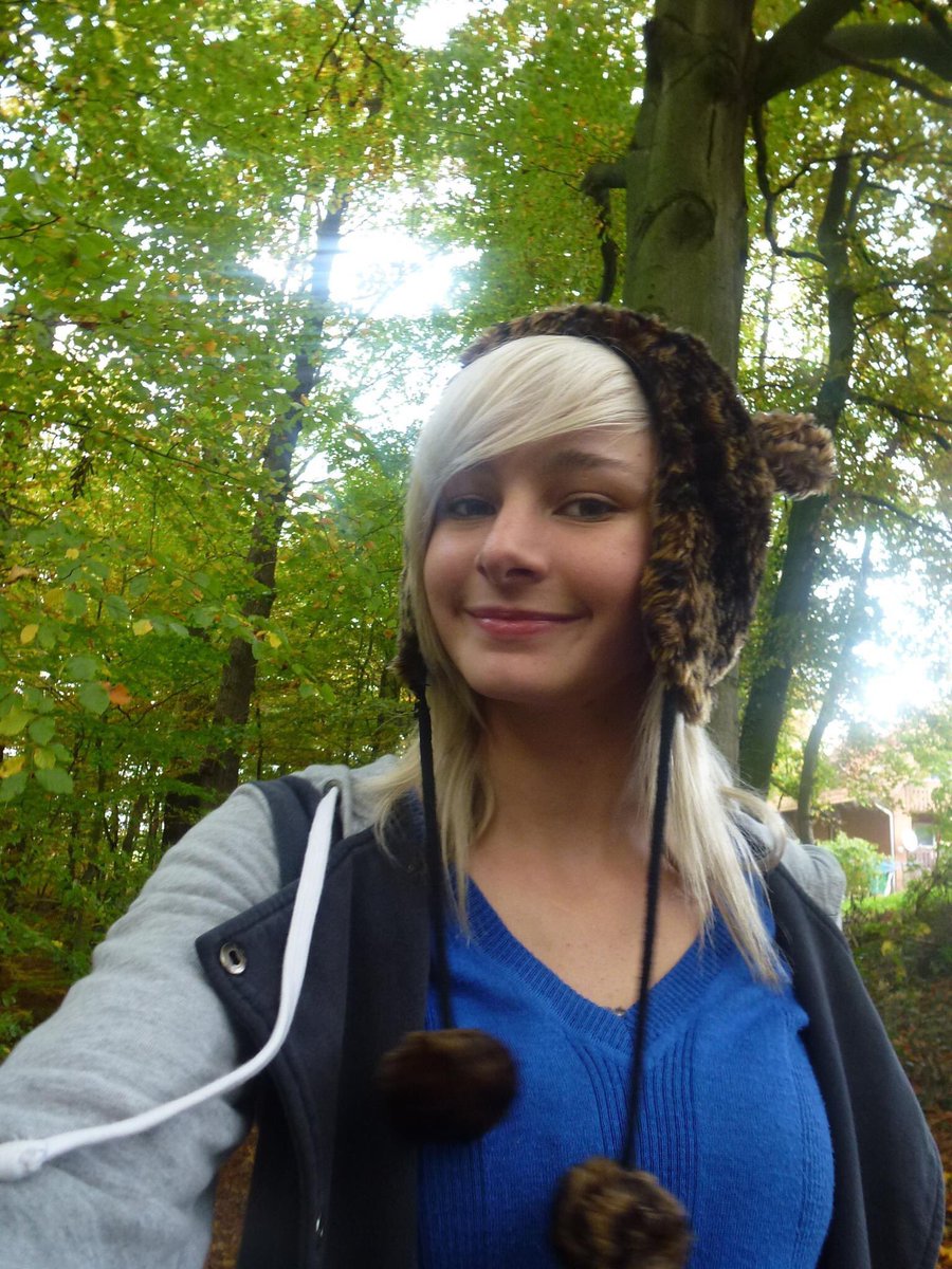 Share a photo of yourself from what feels like another lifetime: Blonde 8 years ago. I had a very smoll cat and lived in Germany for a bit.