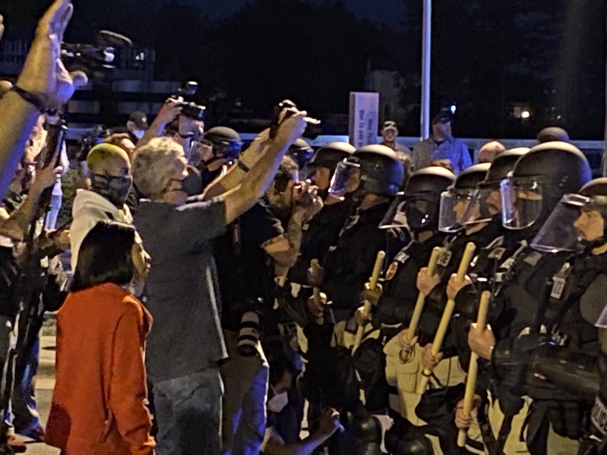 joshshaffer08's tweet image. Police now inches from protesters. Tear gas and munitions threatened. “This could be you out of uniform!” yelled at officers. ⁦@newsobserver⁩ #AndrewBrown