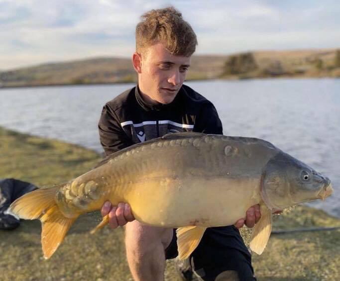 Callum James with two corkers from his local fishing the Pro Baits Uk Squid Orange and TT.