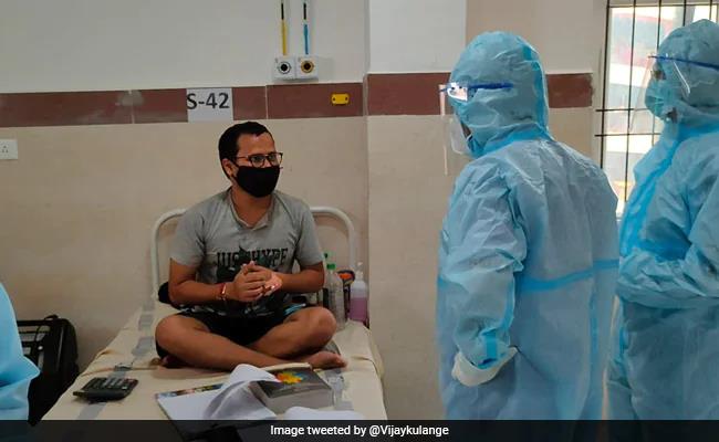 ndtv's tweet photo. #Covid Patient Prepares For CA Exam In Odisha Hospital. Pic Is Viral https://t.co/sOkqkM3PNW https://t.co/VuzVTE5FiB