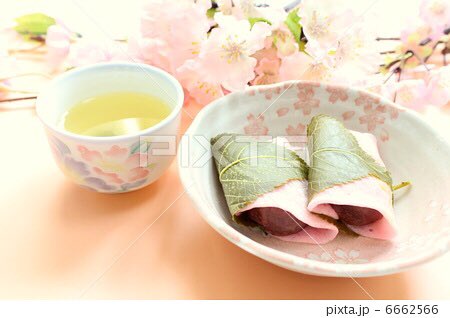 Morever, sakura mochi or something of that type is considered to be ocha gashi, something to eat with tea. This is why many wagashi are quite sweet - the sweetness counteracts the bitterness of the tea. Here are some stock photos of sakura mochi that clearly show them w/tea.