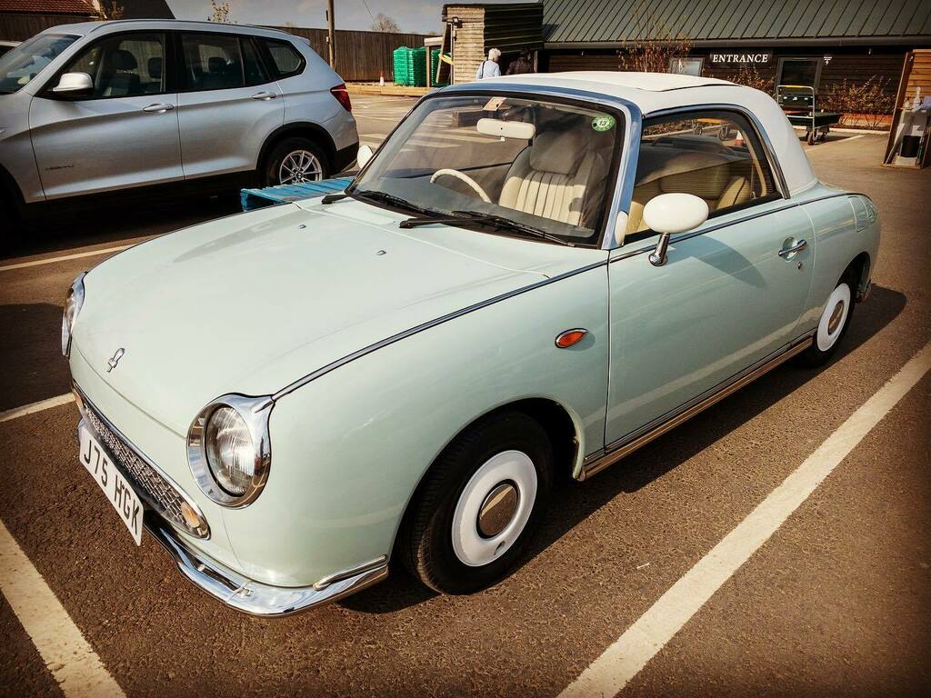 HaddenhamBucks's tweet photo. Only 20000 of these 1991 Nissan Figaro classics were ever built. This one is visiting Haddenham Garden Centre. 
#carsinmyvillage #classiccars #nissanfigaro https://t.co/gV8oK48ARJ https://t.co/LNTfYsKDZK