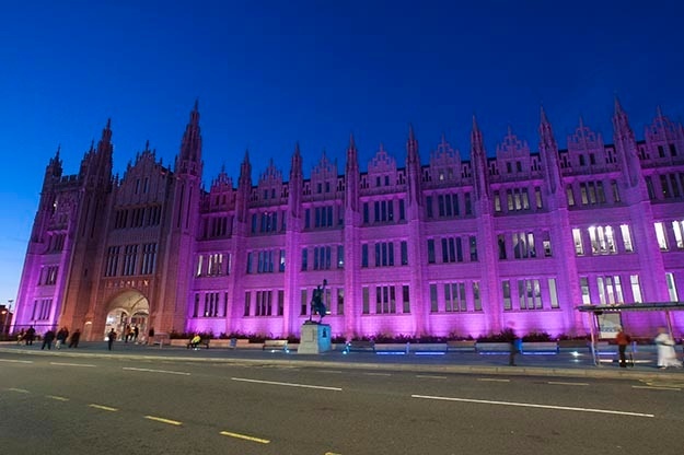 AberdeenCC's tweet photo. Marischal College is being lit-up today in support of  International Workers Memorial Day.  #IWMO https://t.co/i7m45jmHK9