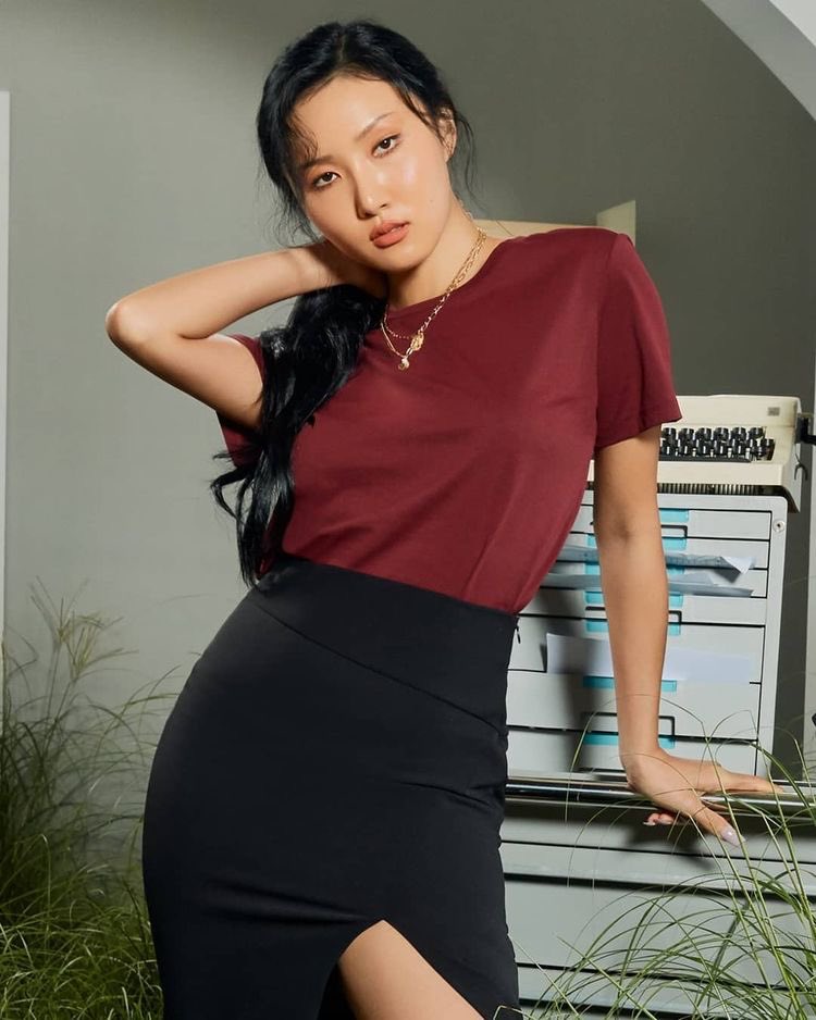 Singer at night, office worker during the day.