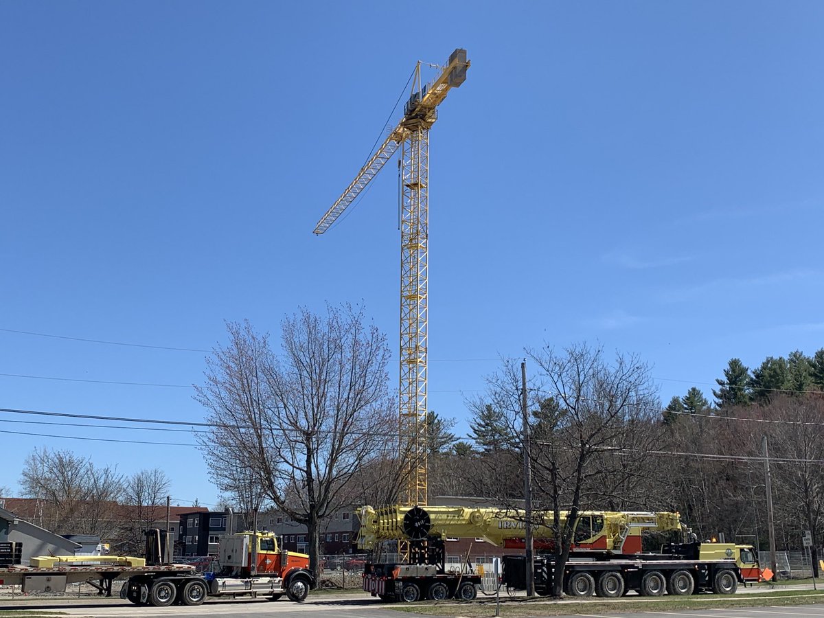 hydrohogg's tweet photo. Tower Crane is up on Rookwood Ave road next to our ⁦@CARIS_GIS⁩ office in #Fredericton #NB the Irving crane truck in the foreground is immense and dropped the tower crane in place, looks small when it’s arm is all collapsed together. New apartments I think are being built! https://t.co/s5j6BrMV65