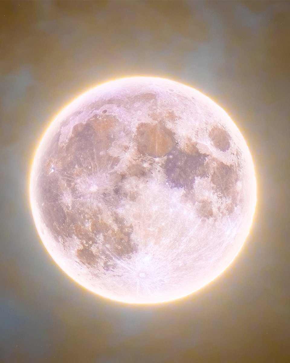 The first of at least two supermoons of 2021 appeared on Monday, lighting up the night sky around the  http://world.It  is also known as a pink moon, after the pink phlox that blooms in springtime, although it is pink in name only.