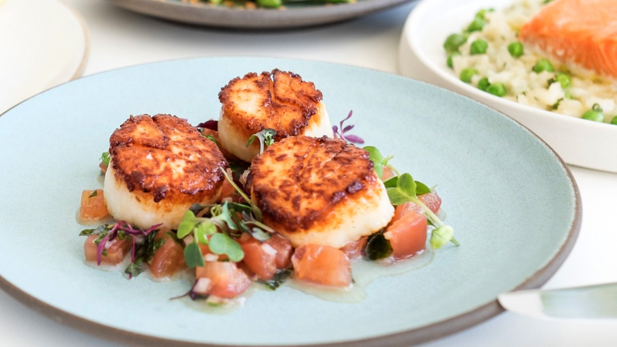 New to the menu! Add our Pan-Seared Scallops with Thai tomato salsa and fresh herbs to your next #Toptable2U order.